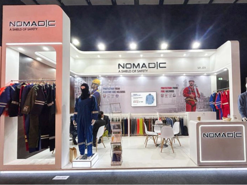 Nomadic FR and IFR workwear exhibition booth at Intersec Dubai showcasing flame resistant safety uniforms and industrial protective clothing display