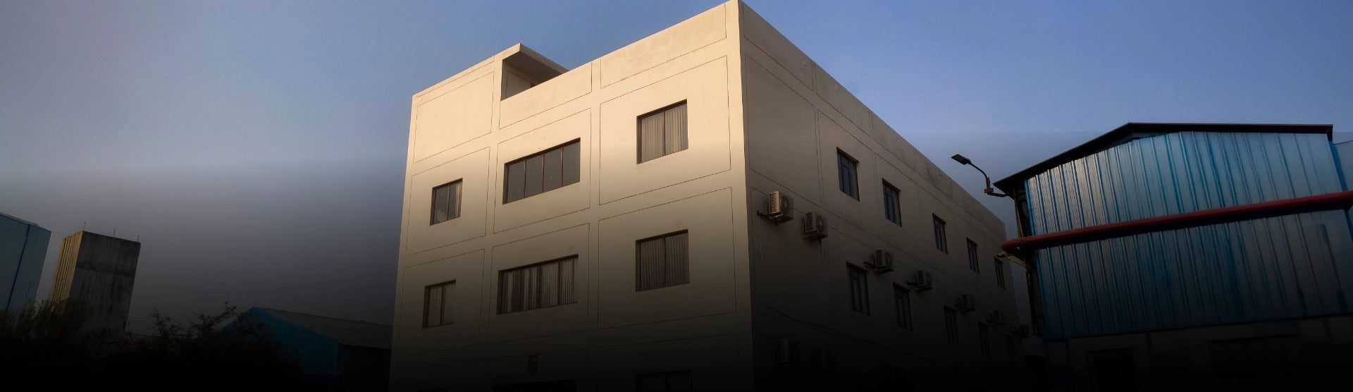 Nomadic protective workwear manufacturing facility exterior